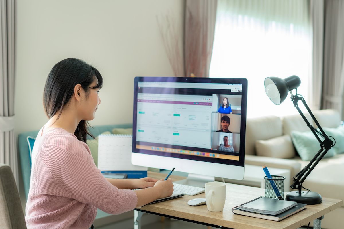 Young woman on group video call Young woman on group video call