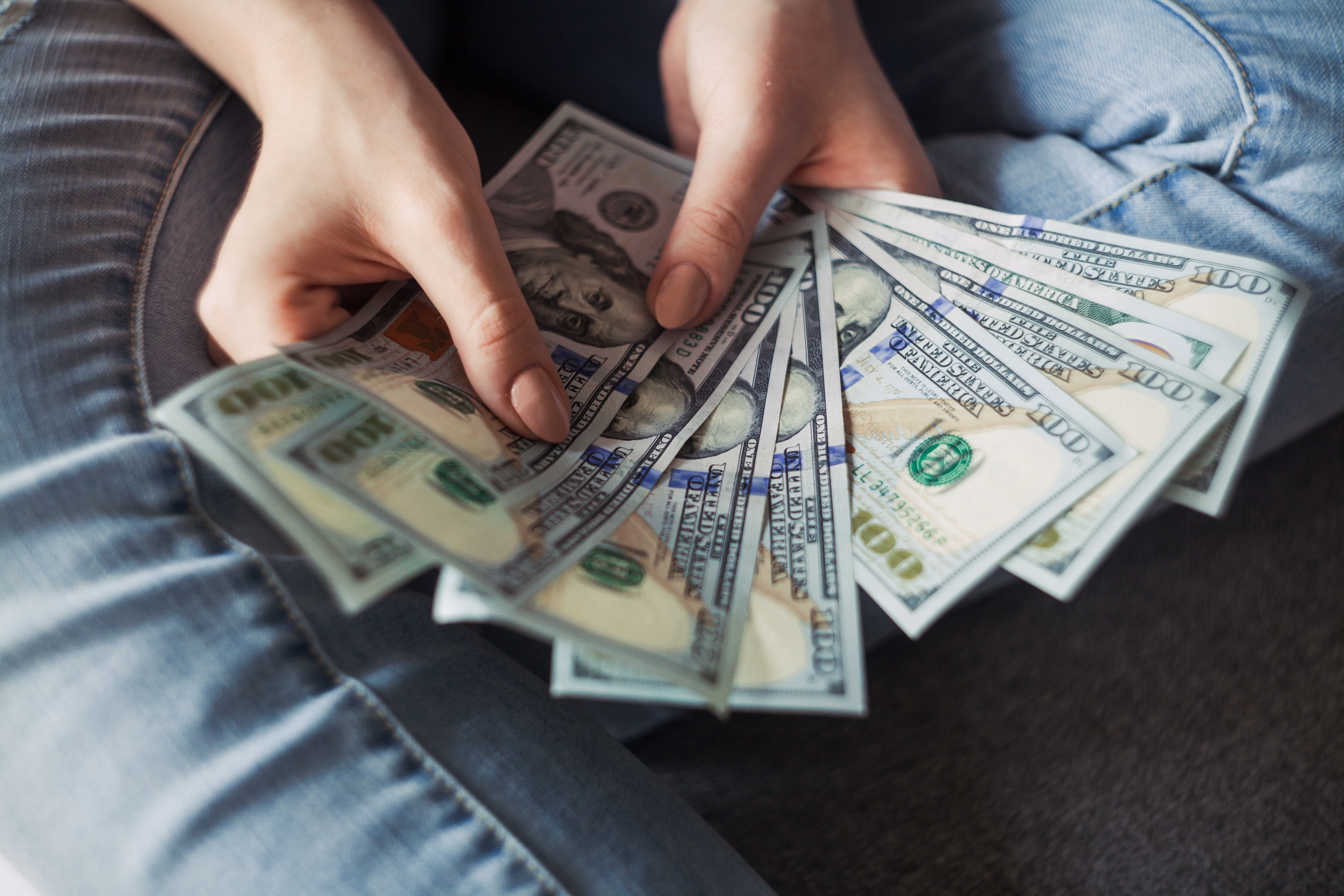 Two Hands Fanning Out Money Two Hands Fanning Out Money